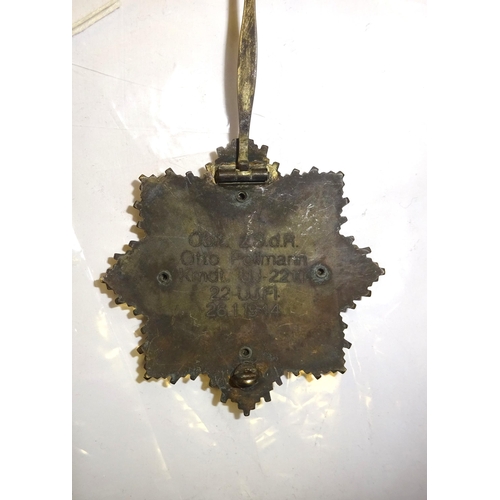 120 - A Third Reich German Cross in silver, dated 1941, named on reverse to 