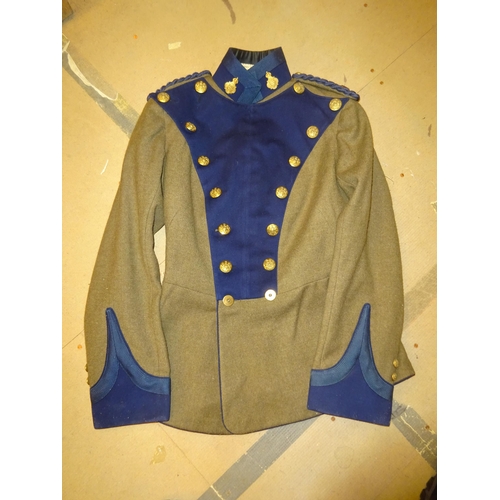 267 - A scarce post 1902 khaki Lancer style plastron fronted tunic of the Sussex Yeomanry, blue plastron, ... 