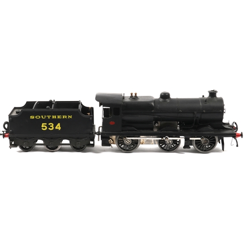 135 - A scratch built O Gauge clockwork 0-4-2 Tender Locomotive. In mat black SOUTHERN livery, RN534. Has ... 