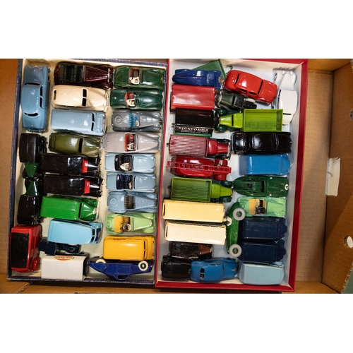 302 - 60 restored Dinky Vehicles. Including Gift Set No.25 and No.33, in reproduction boxes. Plus unboxed ... 