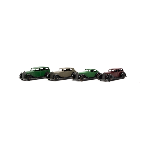 319 - 4 Dinky Toys. Daimler (30) in fawn, Vauxhall (30d) in green, Rover (36d) in green and an Armstrong S... 