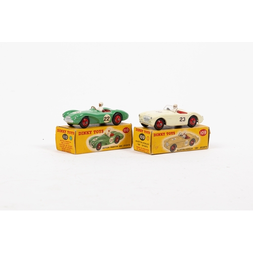 328 - 2 Dinky Toys. Aston Martin DB3 Sports (110). In green with red seats and wheels, RN22. Plus an Austi... 