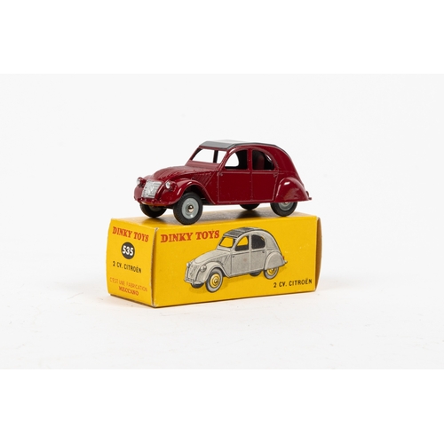 330 - Dinky Toys France. 535 Citroen 2CV in maroon with grey roof, and grey wheel hubs. Comes with origina... 