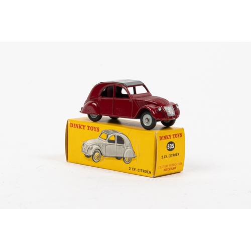 330 - Dinky Toys France. 535 Citroen 2CV in maroon with grey roof, and grey wheel hubs. Comes with origina... 