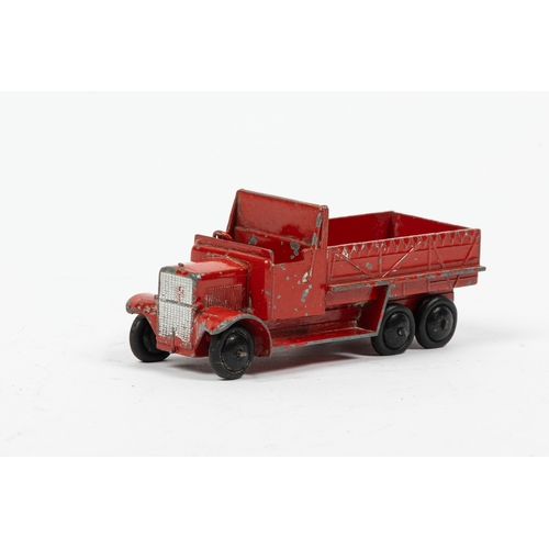 331 - A scarce Dinky Toys 151B Civilian 6 wheeled covered wagon in red with smooth black hubs. Missing the... 