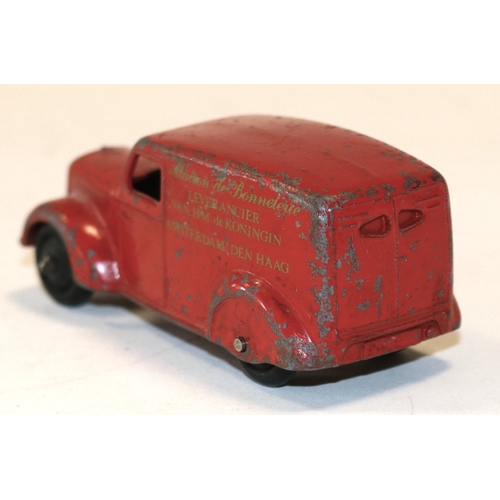 333 - A rare Dinky Toys Dutch promotional Type 3 Delivery Van. A post war example in red with black ridged... 