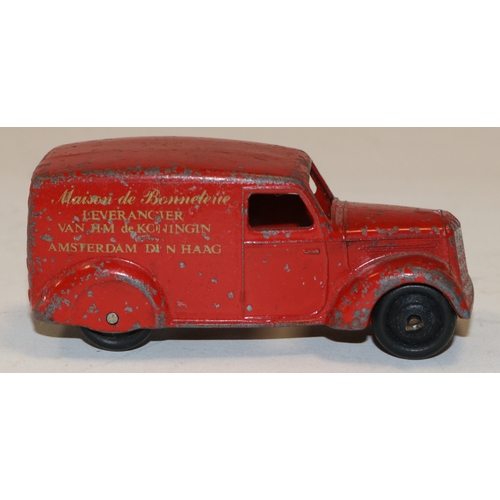 333 - A rare Dinky Toys Dutch promotional Type 3 Delivery Van. A post war example in red with black ridged... 