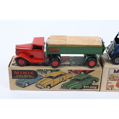 343 - 3 Tri-ang Minic Clockwork Trucks. A Watneys Beer Lorry, Dark green tractor unit, with red barrel and... 