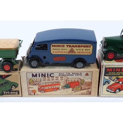 343 - 3 Tri-ang Minic Clockwork Trucks. A Watneys Beer Lorry, Dark green tractor unit, with red barrel and... 