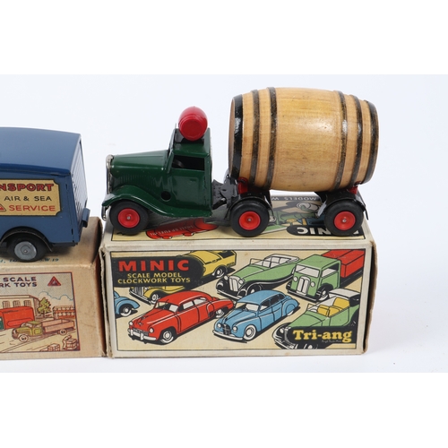 343 - 3 Tri-ang Minic Clockwork Trucks. A Watneys Beer Lorry, Dark green tractor unit, with red barrel and... 