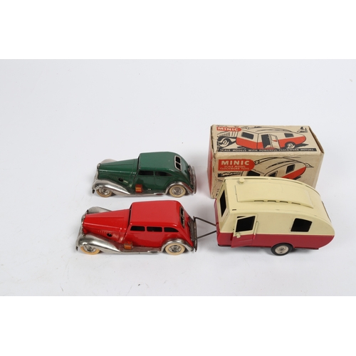 346 - 3 Tri-ang Minic. 2 pre-War clockwork cars, a Limousine, well repainted in bright red, with plated mu... 