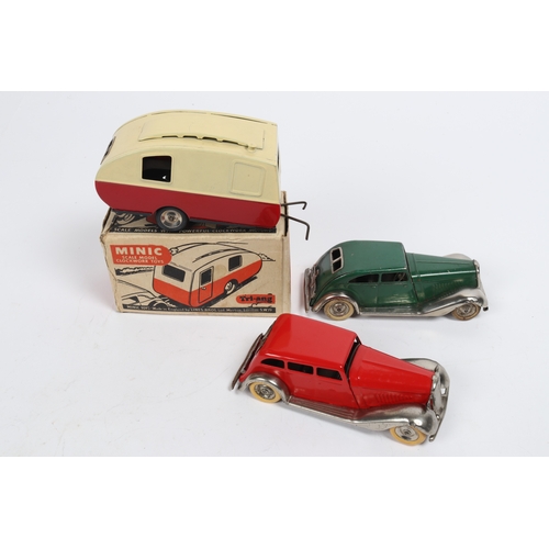 346 - 3 Tri-ang Minic. 2 pre-War clockwork cars, a Limousine, well repainted in bright red, with plated mu... 