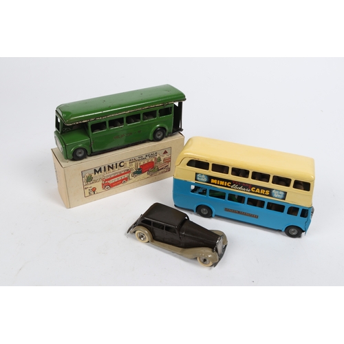 347 - 3 Tri-ang Minic Clockwork Vehicles. A Limousine in dark brown with tan mudguards and running boards,... 