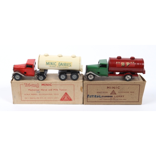 357 - 2 Tri-ang Minic Clockwork Lorries. An Articulated Milk Tanker. An example with a red tractor unit wi... 