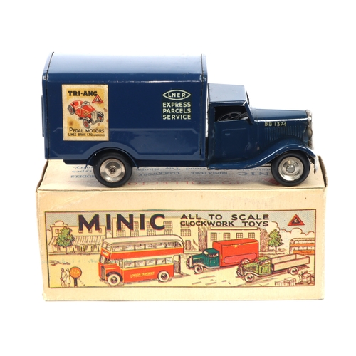 367 - A Tri-ang Minic clockwork LNER Van. In dark blue LNER Express Parcels Service livery, with paper adv... 