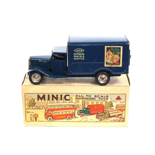 367 - A Tri-ang Minic clockwork LNER Van. In dark blue LNER Express Parcels Service livery, with paper adv... 