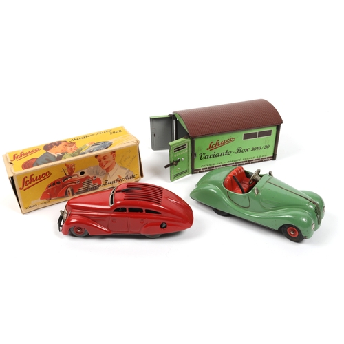 382 - 3 SCHUCO tin plate toys. Varianto -Box 3010/30 garage in green, with 2 sets of opening doors, Schuco... 