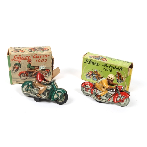 384 - 2 SCHUCO motorcycle toys. Motordrill 1006, in red with rider, No.3 to his back, Boxed with one inner... 