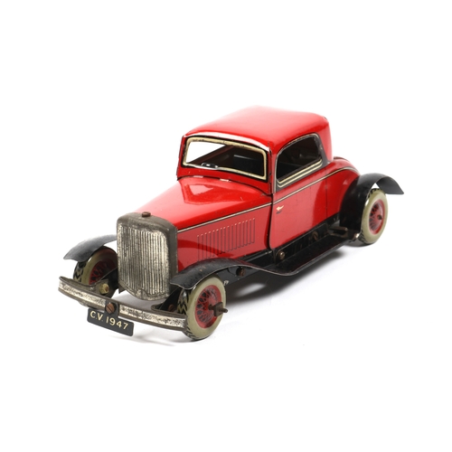 388 - A CHAD VALLEY mechanical coupe construction car, finished in red and black. CV crest to the boot, wo... 