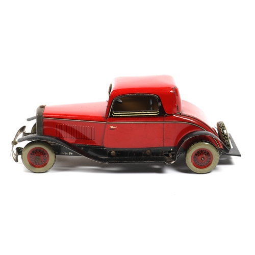 388 - A CHAD VALLEY mechanical coupe construction car, finished in red and black. CV crest to the boot, wo... 