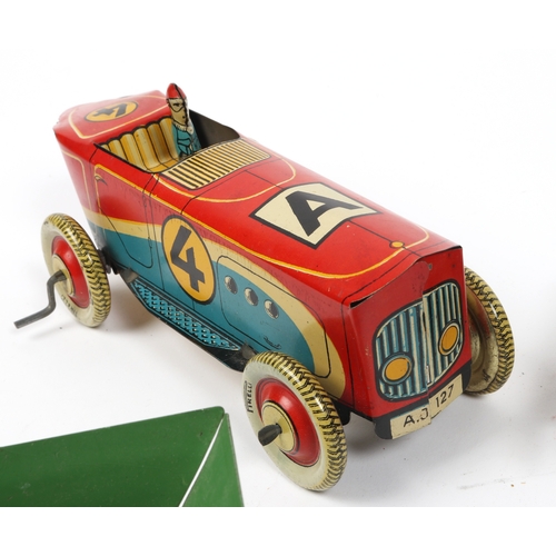 390 - 5 tinplate vehicles by various manufactures. ALTIN TURKMALI  racing car with wind up motor operated ... 