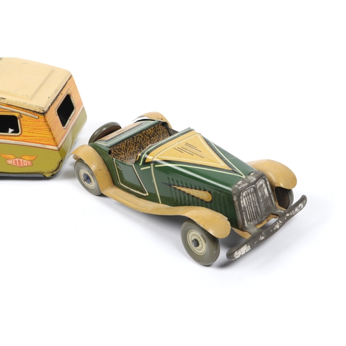 392 - 2 METTOY tin plate win up cars, open top sports car in green and tan, with spare wheel attached to r... 