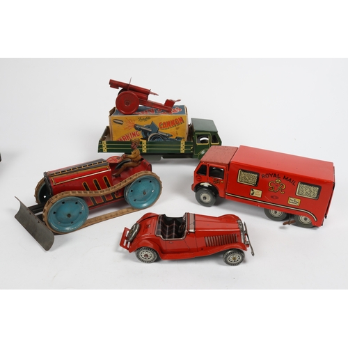 395 - A large Mettoy clockwork tinplate AEC style 3 axle 6 wheel Royal Mail Van. 25cm. In red and yellow G... 