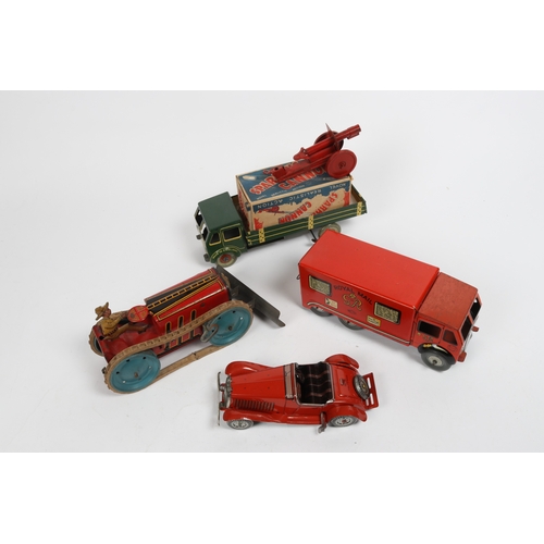 395 - A large Mettoy clockwork tinplate AEC style 3 axle 6 wheel Royal Mail Van. 25cm. In red and yellow G... 