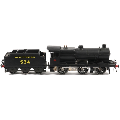 14 - A scratch built O Gauge clockwork 0-4-2 Tender Locomotive. In matt black SOUTHERN livery, RN534. Has... 