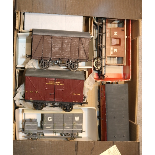 16 - O gauge freight and passenger rolling stock. 15 freight wagons, including examples by Slaters, Parks... 