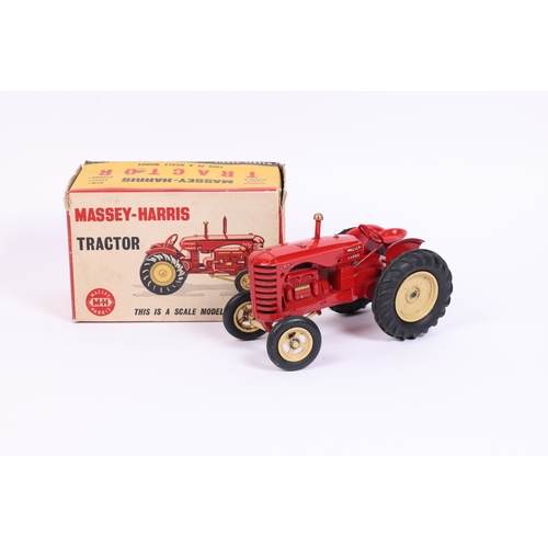 386 - A scarce Lesney Massey Harris 745D Tractor. In red with cream wheels, fitted with rubber tyres. Boxe... 