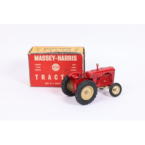 386 - A scarce Lesney Massey Harris 745D Tractor. In red with cream wheels, fitted with rubber tyres. Boxe... 