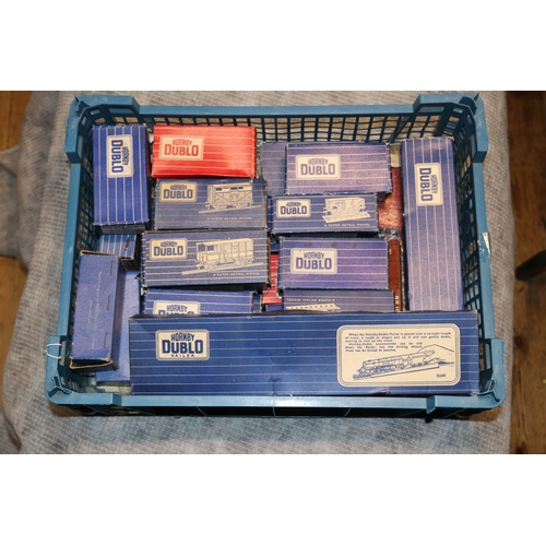 41 - A quantity of Hornby Dublo railway. 5 suburban coaches and a corridor coach. 20 plus boxed freight w... 