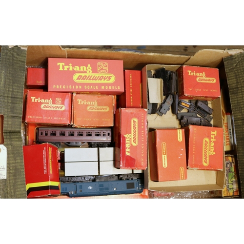 61 - A good quantity of Tri-ang OO Gauge Railway. Including many Freight Wagons including 4-Rocket Launch... 