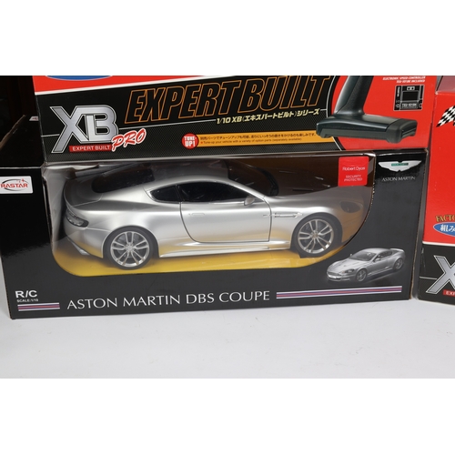 267 - 2x Tamiya 1:10 scale sports/racing cars. Porsche Carrera G.T. . In silver, plus a Mercedes-Benz C-Cl... 