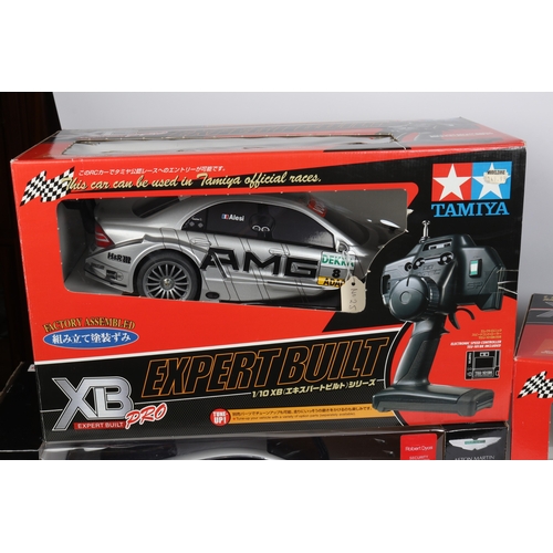 267 - 2x Tamiya 1:10 scale sports/racing cars. Porsche Carrera G.T. . In silver, plus a Mercedes-Benz C-Cl... 