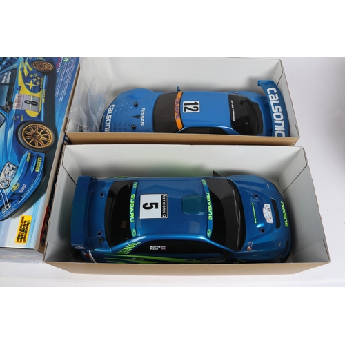 269 - 2 TAMIYA 1:10 scale Radio Controlled High Performance Racing Cars. A Subaru Impreza WRC 2003 and a C... 