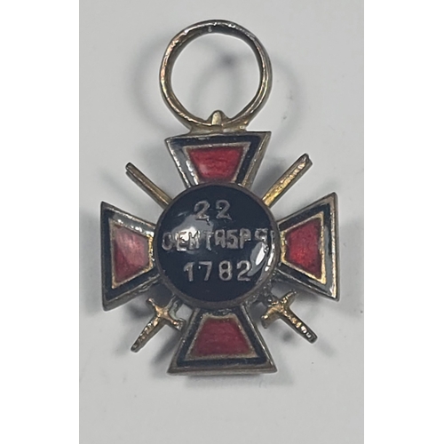 56 - Miniature Russian order of St Anne.