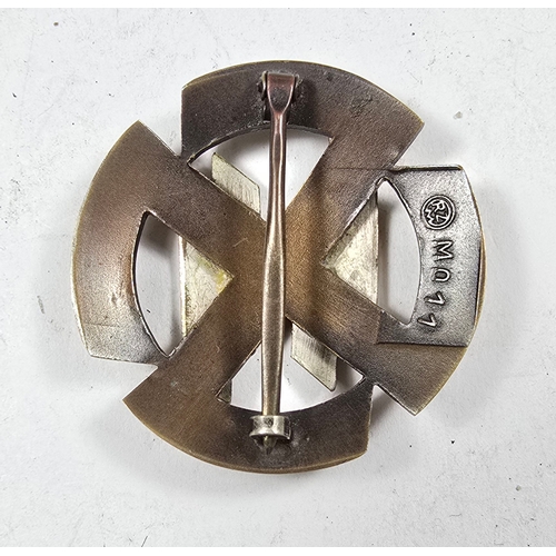 A Third Reich Germanic Proficiency Runes badge in bronze, the back ...