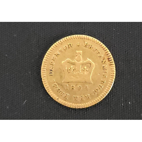 21 - Third Guinea, George III 1804 GF or better.