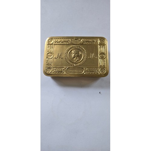 58 - 1914 Christmas tin contains partial cigarettes etc.