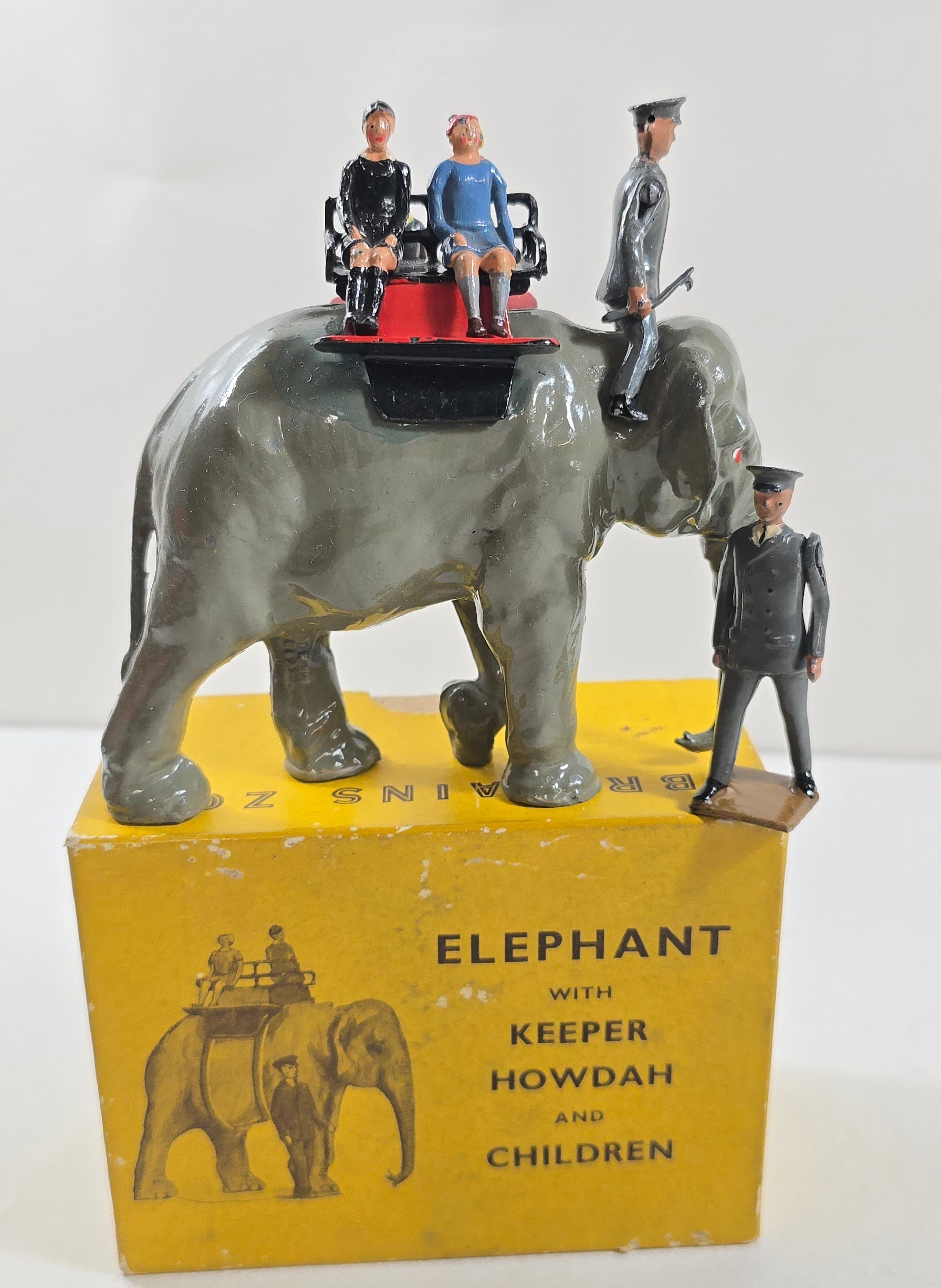 BRITAINS. Elephant with Keeper Howdah and children. Elephant has had a ...