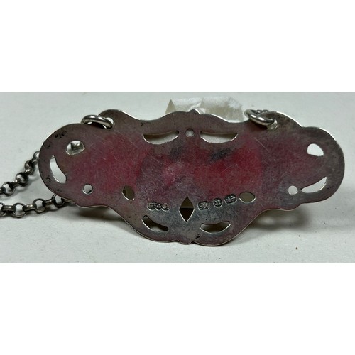 57 - A Victorian silver wine label, pierced and engraved with border and 