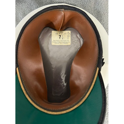 188 - A Naval Nautical Training Corps officer's cap with bullion badge; and a blue wool yachting cap with ... 