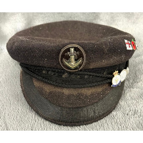 188 - A Naval Nautical Training Corps officer's cap with bullion badge; and a blue wool yachting cap with ... 