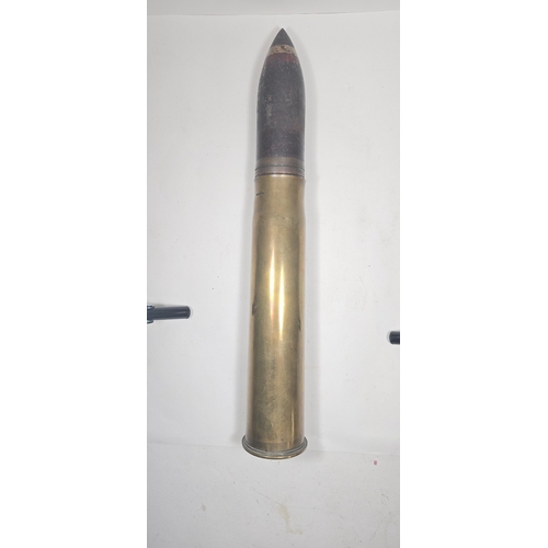 470 - An inert, unfired, WWI 6pr armour piercing explosive shell with brass case dated 1917, GC, the mouth... 