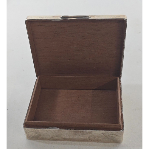 52 - An H.M. silver presentation cigarette box, Birmingham 1972 with maker's mark E&N S, lid engraved... 