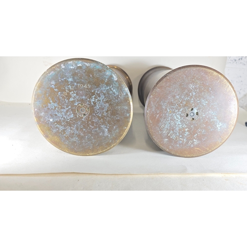 11 - A pair of WW2 U.S. brass shell cases dated 1944 and 1945 respectively, 40.5cms tall, flared at the t... 