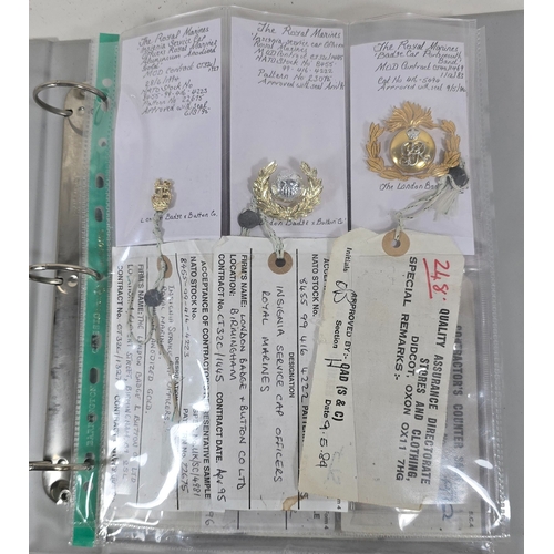 218 - An album containing nine MOD sealed pattern Royal Marines cap badges and fittings and another contai... 