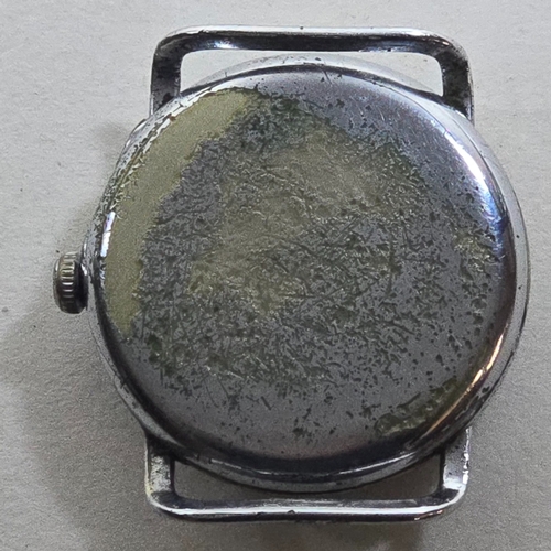 18 - A Helvetia pilots style wristwatch circa 1935. Movement AF, the chrome plated case worn overall, dia... 
